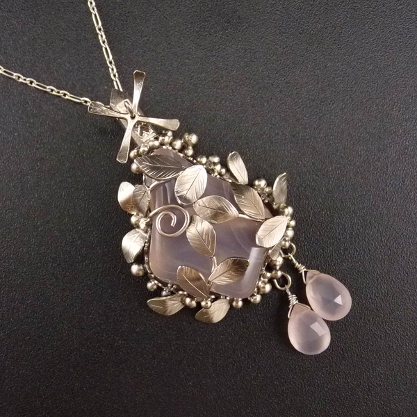 Okvetený větrný mlýn..amulet