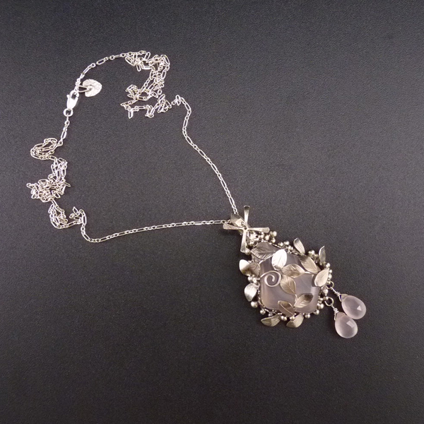 Okvetený větrný mlýn..amulet