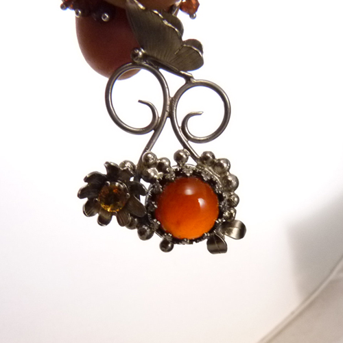 Motýl, co granáty miluje..amulet